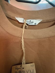Oversize-Bluse in Braun mit Karomuster und Langarm — Bild 2 von 3 anzeigen
