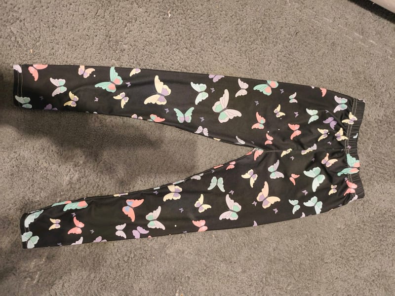 Mädchen Leggings mit Schmetterlingsmuster in Pastellfarben – Größe 110 – Schwarz