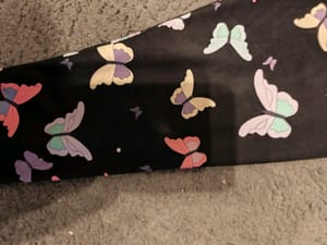 Mädchen Leggings mit Schmetterlingsmuster in Pastellfarben – Größe 110 – Schwarz – Bild 2 von 2