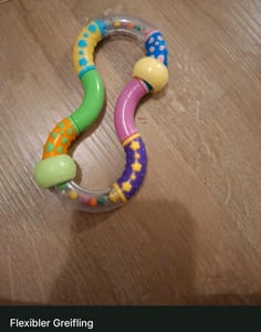 Verschiedene Rasseln – Babyspielzeug-Set – Bild 4 von 7